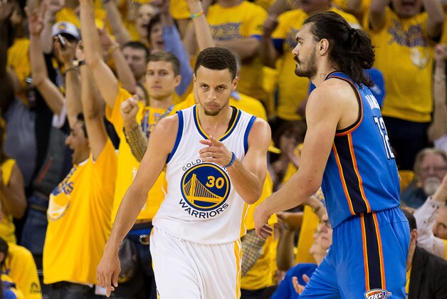 May 26, 2016; Oakland, CA, USA; Golden State Warriors guard Stephen Curry (30) celebrates in front of Oklahoma City Thunder center Steven Adams (12) after scoring during the third quarter in game five of the Western conference finals of the NBA Playoffs at Oracle Arena. Mandatory Credit: Kelley L Cox-USA TODAY Sports