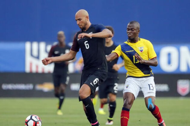 U.S. defender John Brooks (6) controls the ball as Ecuador midfielder Enner Valencia pressures during the first half of an exhibition soccer match, Wednesday, May 25, 2016, in Frisco, Texas. (AP Photo/Tony Gutierrez)