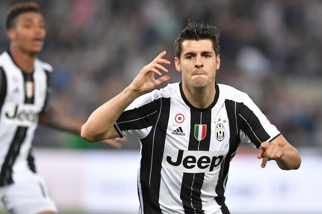 Juventus' forward from Spain Alvaro Morata celebrates after scoring during the Italian Tim Cup final football match AC Milan vs Juventus on May 21, 2016 at the Olympic Stadium in Rome.    AFP PHOTO / TIZIANA FABI / AFP / TIZIANA FABI        (Photo credit should read TIZIANA FABI/AFP/Getty Images)