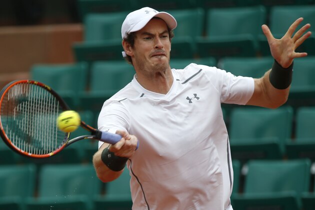 Britain's Andy Murray returns the ball to Croatia's Ivo Karlovic during their third round match of the French Open tennis tournament at the Roland Garros stadium, Friday, May 27, 2016 in Paris. (AP Photo/Alastair Grant)