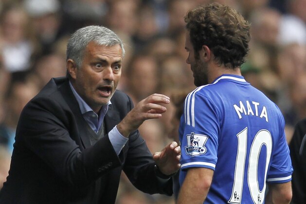 Chelsea's Portuguese manager Jose Mourinho (L) gestures to Chelsea's Spanish midfielder Juan Mata (R) during the English Premier League football match between Tottenham Hotspur and Chelsea at White Hart Lane in London on September 28, 2013.  AFP PHOTO/ IAN KINGTON  

RESTRICTED TO EDITORIAL USE. NO USE WITH UNAUTHORIZED AUDIO, VIDEO, DATA, FIXTURE LISTS, CLUB/LEAGUE LOGOS OR LIVE SERVICES. ONLINE IN-MATCH USE LIMITED TO 45 IMAGES, NO VIDEO EMULATION. NO USE IN BETTING, GAMES OR SINGLE CLUB/LEAGUE/PLAYER PUBLICATIONS        (Photo credit should read IAN KINGTON/AFP/Getty Images)