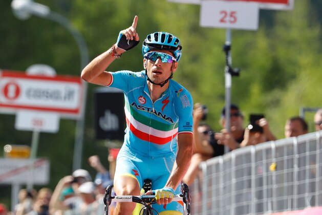 Italy's Vincenzo Nibali of team Astana celebrates as he crosses the finish line to win the 19th stage of the 99th Giro d'Italia, Tour of Italy, from Pinerolo to Risoul on May 27, 2016.  / AFP / Luk BENIES        (Photo credit should read LUK BENIES/AFP/Getty Images)