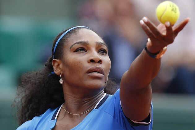Serena Williams of the U.S. serves the ball to Brazil's Teliana Pereira during their second round match of the French Open tennis tournament at the Roland Garros stadium, Thursday, May 26, 2016 in Paris. (AP Photo/Michel Euler)