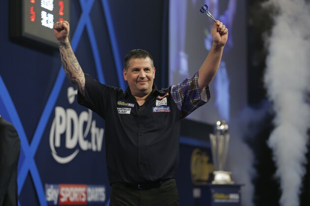 Gary Anderson celebrates winning the match and title during the Gary Anderson v Adrian Lewis PDC World Darts Championship Final on January 3rd 2016 in London (Photo by Tom Jenkins/Getty Images)