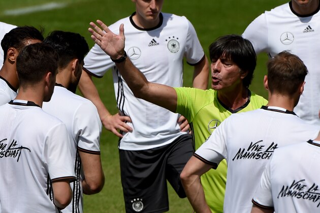 Germany's head coach Joachim Loew  (C) speaks to his players during a training session as part of the team's preparation for the upcoming Euro 2016 European football championships, on May 26, 2016 in Ascona. / AFP / PATRIK STOLLARZ        (Photo credit should read PATRIK STOLLARZ/AFP/Getty Images)