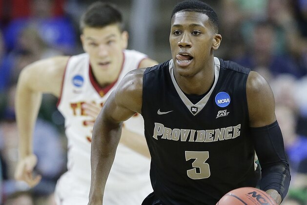 Providence guard Kris Dunn (3) moves the ball as Southern California forward Nikola Jovanovic (32) looks on during the first half of a first-round men's college basketball game in the NCAA Tournament, Thursday, March 17, 2016, in Raleigh, N.C. (AP Photo/Gerry Broome) Providence guard Kris Dunn (3) moves the ball as Southern California forward Nikola Jovanovic (32) looks on during the first half of a first-round men's college basketball game in the NCAA Tournament, Thursday, March 17, 2016, in Raleigh, N.C. (AP Photo/Gerry Broome)