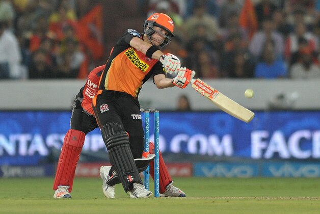 Sunrisers Hyderabad captain David Warner plays a shot during the 2016 Indian Premier League (IPL) Twenty20 cricket match between Sunrisers Hyderabad and Royal Challengers Bangalore at The Rajiv Gandhi International Stadium in Hyderabad  on April 30, 2016.  / AFP / NOAH SEELAM        (Photo credit should read NOAH SEELAM/AFP/Getty Images)