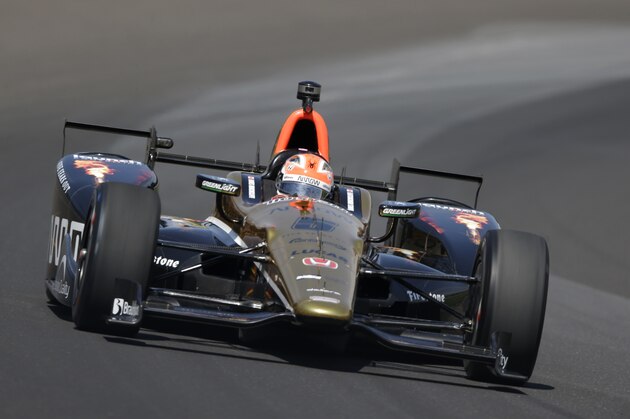 James Hinchcliffe, of Canada, drives through turn one during the final practice session for the Indianapolis 500 auto race at Indianapolis Motor Speedway in Indianapolis, Friday, May 27, 2016. (AP Photo/Michael Conroy)