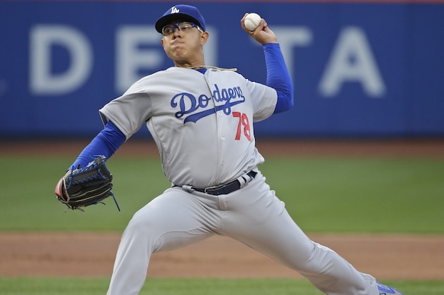 Los Angeles Dodgers' Julio Arias delivers a pitch during the first inning of a baseball game against the New York Mets on Friday, May 27, 2016, in New York. (AP Photo/Frank Franklin II)