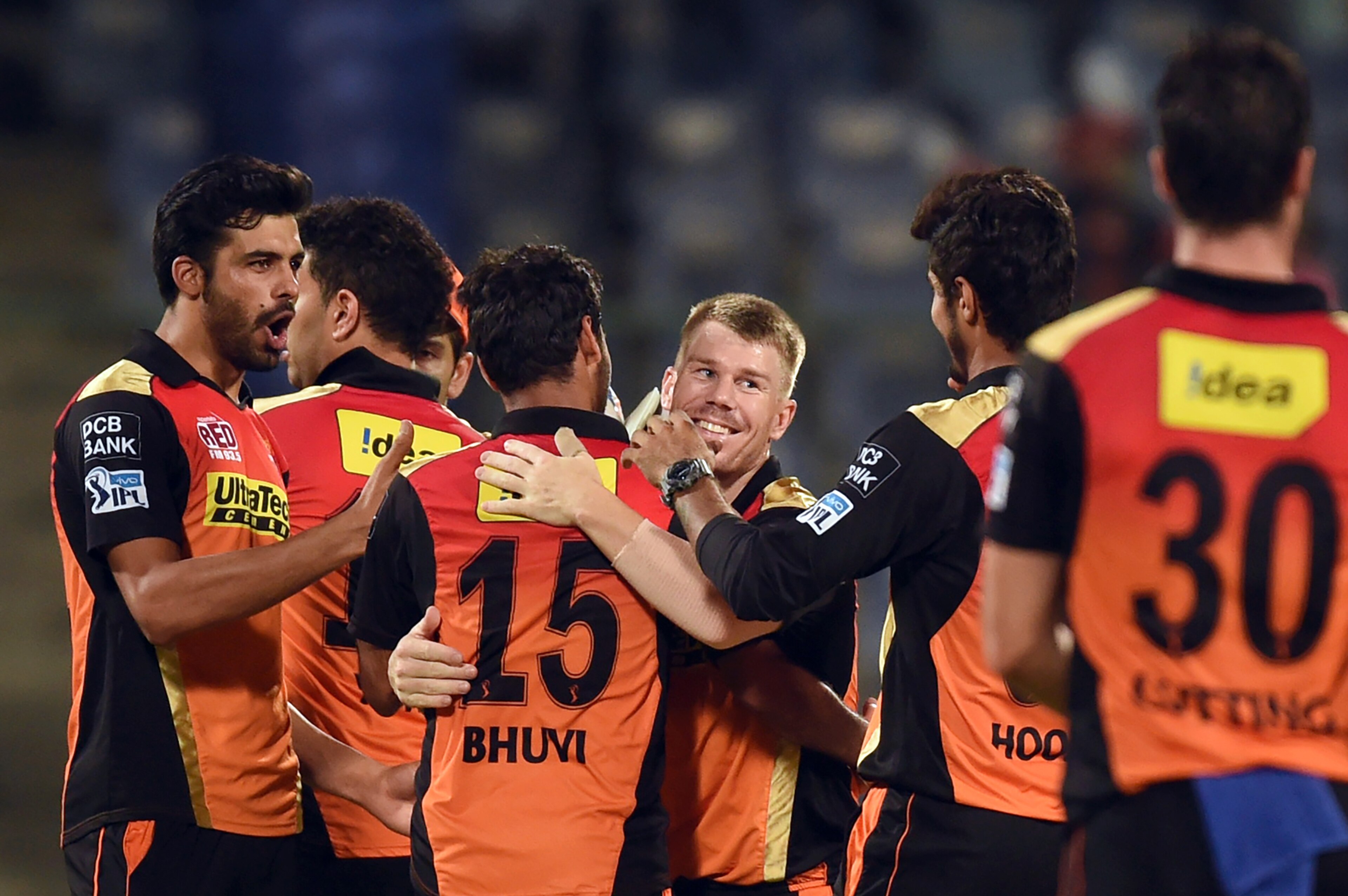 Sunrisers Hyderabad captain David Warner (C) celebrates the victory over Kolkata Knight Riders with teammates  during the 2016 Indian Premier League (IPL) Twenty20 eliminator cricket match between Kolkata Knight Riders and Sunrisers Hyderabad at the Feroz Shah Kotla Cricket Stadium in New Delhi on May 25, 2016. / AFP / PRAKASH SINGH        (Photo credit should read PRAKASH SINGH/AFP/Getty Images)
