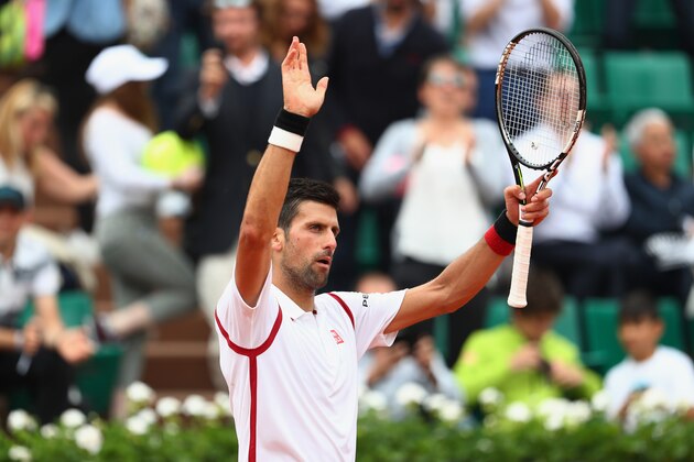 PARIS, FRANCE - MAY 26:  Novak Djokovic of Serbia celebrates victory during the Men's Singles second round match against Steve Darcis of Belgium on day five of the 2016 French Open at Roland Garros on May 26, 2016 in Paris, France.  (Photo by Julian Finney/Getty Images)