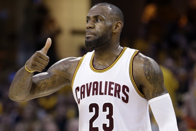Cleveland Cavaliers' LeBron James (23) gestures during the first half against the Toronto Raptors in Game 2 of the NBA basketball Eastern Conference finals Thursday, May 19, 2016, in Cleveland. (AP Photo/Tony Dejak)