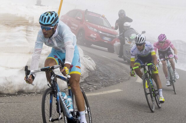 From left, Italian rider Vincenzo Nibali of Astana Pro Team, Colombia's Vincenzo Nibali of Orica GreenEdge and Dutch rider Steven Kruijswijk of Team Lotto Jumbo pedal during the 19th stage of the Cycling Tour of Italy from Pinerolo to Risoul, Friday, May 27, 2016. (Claudio Peri/ANSA via AP)