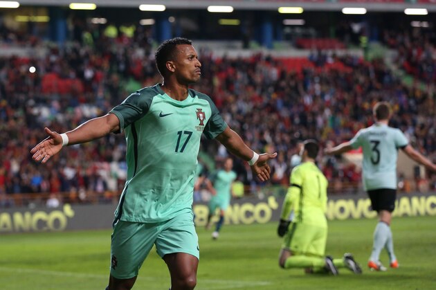 Portugal’s Nani celebrates after scoring the opening goal during a friendly soccer match between Portugal and Belgium in Leiria, Portugal, Tuesday, March 29 2016. (AP Photo/Steven Governo)