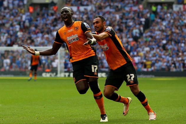 LONDON, ENGLAND - MAY 28:  Mohamed Diame (L) of Hull City celebrates scoring his team's first goal with his team mate Ahmed Elmohamady (R) during Sky Bet Championship Play Off Final match between Hull City and Sheffield Wednesday at Wembley Stadium on May 28, 2016 in London, England.  (Photo by Alex Livesey/Getty Images)