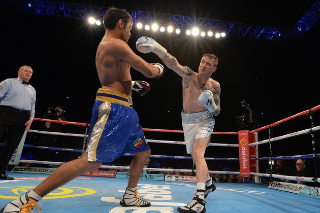 GLASGOW, SCOTLAND - MAY 28: Ricky Burns of Scotland (White Shorts) and Michele Di Rocco of Italy (Blue Shorts) during the WBA world super-lightweight title fight at The SSE Hydro on May 28, 2016 in Glasgow, Scotland. (Photo by Mark Runnacles/Getty Images)