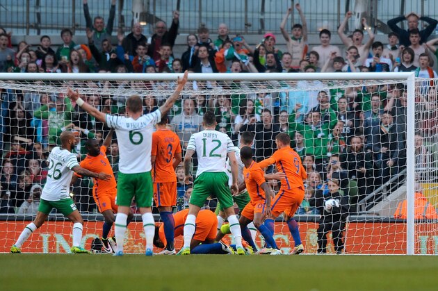 Republic of Ireland players celebrate the goal of Shane Long during the friendly football match between Ireland and the Netherlands at the Aviva Stadium in Dublin, Ireland, on May 27, 2016. / AFP / CAROLINE QUINN        (Photo credit should read CAROLINE QUINN/AFP/Getty Images)