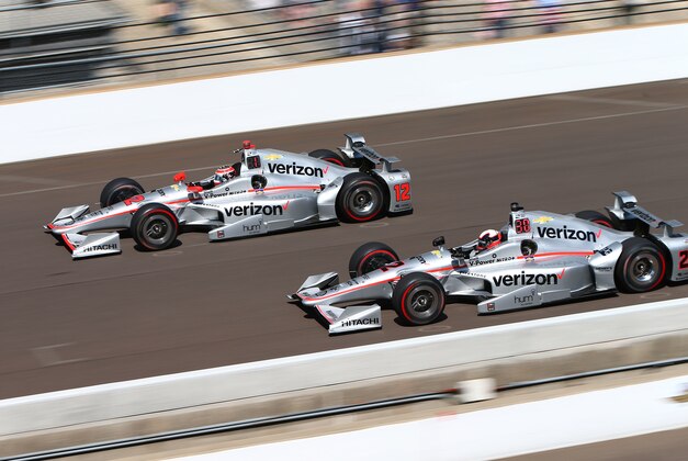 May 27, 2016; Indianapolis, IN, USA; IndyCar Series driver Will Power (left) races alongside teammate Juan Pablo Montoya during Carb Day for the Indianapolis 500 at Indianapolis Motor Speedway. Mandatory Credit: Mark J. Rebilas-USA TODAY Sports