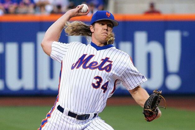 May 28, 2016; New York City, NY, USA; New York Mets starting pitcher Noah Syndergaard (34) pitches against the Los Angeles Dodgers during the first inning at Citi Field. Mandatory Credit: Andy Marlin-USA TODAY Sports