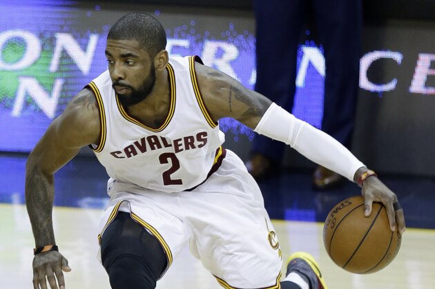 Cleveland Cavaliers' Kyrie Irving (2) looks to drive against the Toronto Raptors during the first half of Game 5 of the NBA basketball Eastern Conference finals Wednesday, May 25, 2016, in Cleveland. (AP Photo/Tony Dejak)