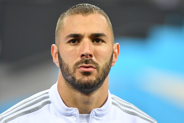 Real Madrid's French forward Karim Benzema looks on before the UEFA Champions League final football match between Real Madrid and Atletico Madrid at San Siro Stadium in Milan, on May 28, 2016. / AFP / GERARD JULIEN        (Photo credit should read GERARD JULIEN/AFP/Getty Images)
