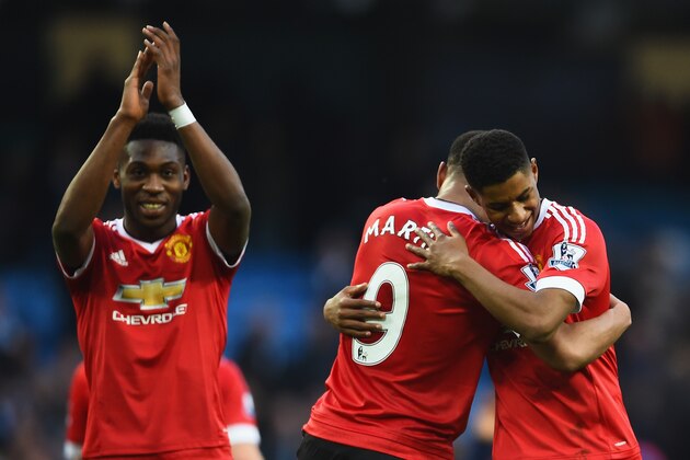 MANCHESTER, ENGLAND - MARCH 20:  Winning goalscorer Marcus Rashford of Manchester United (R) and team mates Anthony Martial (C) and Timothy Fosu-Mensah celebrate victory after the Barclays Premier League match between Manchester City and Manchester United at Etihad Stadium on March 20, 2016 in Manchester, United Kingdom.  (Photo by Laurence Griffiths/Getty Images)
