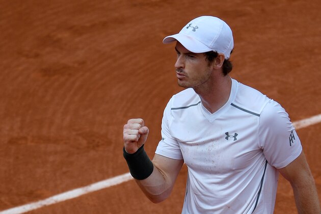 Great Britain's Andy Murray celebrates after beating Croatia's Ivo Karlovic during their men's third round match at the Roland Garros 2016 French Tennis Open in Paris on May 27, 2016. / AFP / MARTIN BUREAU        (Photo credit should read MARTIN BUREAU/AFP/Getty Images)