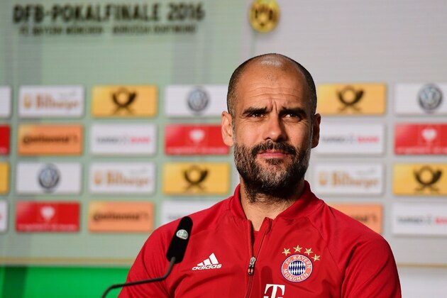 Bayern Munich's Spanish head coach Pep Guardiola addresses a press conference on the eve of the German Cup (DFB Pokal) final football match Bayern Munich vs Borussia Dortmund at the Olympic stadium in Berlin on May 20, 2016. / AFP / TOBIAS SCHWARZ        (Photo credit should read TOBIAS SCHWARZ/AFP/Getty Images)