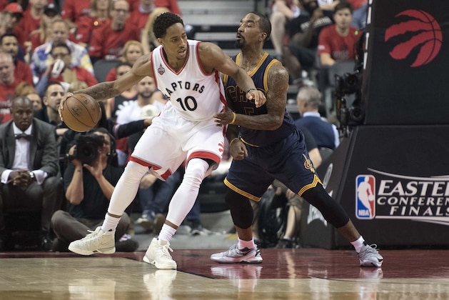 May 27, 2016; Toronto, Ontario, CAN; Toronto Raptors guard DeMar DeRozan (10) looks to play a ball as Cleveland Cavaliers guard J.R. Smith (5) tries to defend during the third quarter in game six of the Eastern conference finals of the NBA Playoffs at Air Canada Centre. The Cleveland Cavaliers won 113-87. Mandatory Credit: Nick Turchiaro-USA TODAY Sports