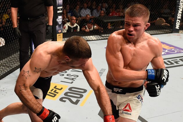 LAS VEGAS, NV - MAY 29: (R-L) Rick Story punches Tarec Saffiedine of Belgium in their welterweight bout during the UFC Fight Night event inside the Mandalay Bay Events Center on May 29, 2016 in Las Vegas, Nevada. (Photo by Josh Hedges/Zuffa LLC/Zuffa LLC via Getty Images) LAS VEGAS, NV - MAY 29: (R-L) Rick Story punches Tarec Saffiedine of Belgium in their welterweight bout during the UFC Fight Night event inside the Mandalay Bay Events Center on May 29, 2016 in Las Vegas, Nevada. (Photo by Josh Hedges/Zuffa LLC/Zuffa LLC via Getty Images)