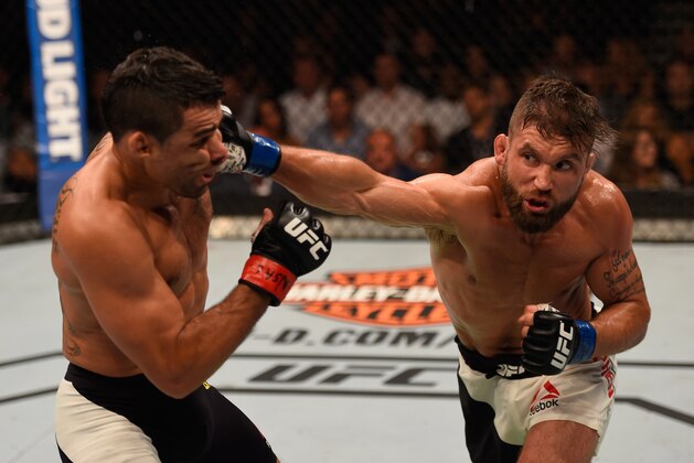 LAS VEGAS, NV - MAY 29: (R-L) Jeremy Stephens punches Renan Barao of Brazil in their featherweight bout during the UFC Fight Night event inside the Mandalay Bay Events Center on May 29, 2016 in Las Vegas, Nevada.  (Photo by Josh Hedges/Zuffa LLC/Zuffa LLC via Getty Images)