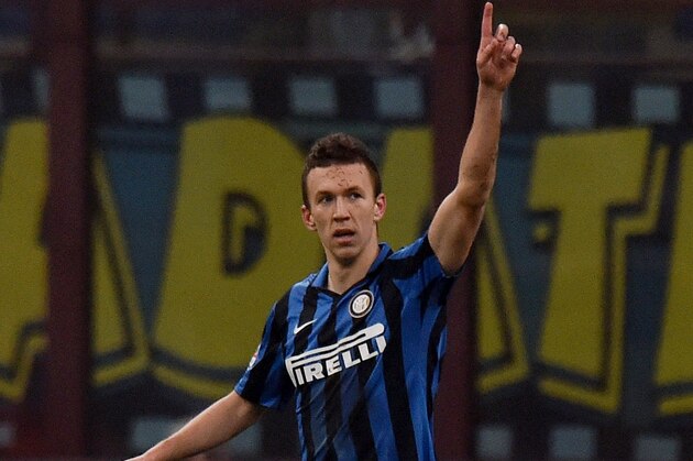 MILAN, ITALY - MARCH 06:  Ivan Perisic of Inter celebrates after scoring his team's third goal during the Serie A match between FC Internazionale Milano and US Citta di Palermo at Stadio Giuseppe Meazza on March 6, 2016 in Milan, Italy.  (Photo by Tullio M. Puglia/Getty Images)