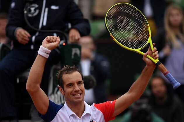 PARIS, FRANCE - MAY 29:  Richard Gasquet of France celebrates victory during the Men's Singles fourth round match against Kei Nishikori of Japan on day eight of the 2016 French Open at Roland Garros on May 29, 2016 in Paris, France.  (Photo by Dennis Grombkowski/Getty Images)