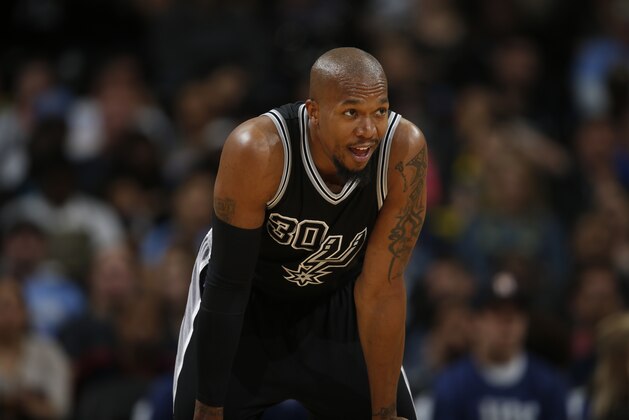 San Antonio Spurs forward David West (30) in the second half of an NBA basketball game Friday, April 8, 2016, in Denver. The Nuggets won 102-98. (AP Photo/David Zalubowski)