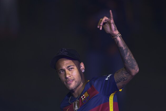 Barcelona's Neymar celebrates at the Camp Nou stadium in Barcelona, Spain, Monday, May 23, 2016. Barcelona's added the Copa del Rey to its Spanish league title on Sunday, but fell short of repeating its treble from last season. (AP Photo/Manu Fernandez)