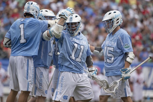 PHILADELPHIA, PA - MAY 30: Brian Cannon #11 of the North Carolina Tar Heels celebrates with Luke Goldstock #1, and Timmy Kelly #15 after a goal against the Maryland Terrapins in the NCAA Division I Men's Lacrosse Championship at Lincoln Financial Field on May 30, 2016 in Philadelphia, Pennsylvania. (Photo by Mitchell Leff/Getty Images)