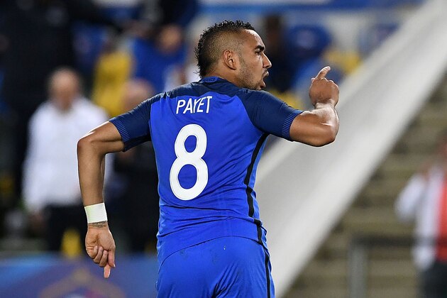 France's forward Dimitri Payet celebrates after scoring a goal during the International friendly football match between France and Cameroon at the Beaujoire stadium, in Nantes, western France, on May 30, 2016 as part of the French team's preparation for the upcoming Euro 2016 European football championships. / AFP / FRANCK FIFE        (Photo credit should read FRANCK FIFE/AFP/Getty Images)