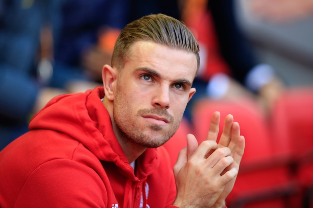 Liverpool’s Jordan Henderson sits on the stands during the Europa League semifinal, second leg, soccer match between Liverpool and  Villarreal at Anfield Stadium, Liverpool, England, Thursday May 5, 2016. Liverpools team captain Henderson  couldn't play due to an injury. (AP Photo/Jon Super)