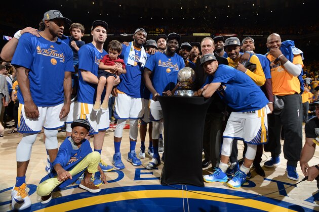 OAKLAND, CA - MAY 30: The Golden State Warriors pose with the Western Conference Final Championship trophy after the win against the Oklahoma City Thunder for Game Seven of the Western Conference Finals during the 2016 NBA Playoffs on May 30, 2016 at ORACLE Arena in Oakland, California. NOTE TO USER: User expressly acknowledges and agrees that, by downloading and or using this Photograph, user is consenting to the terms and conditions of the Getty Images License Agreement. Mandatory Copyright Notice: Copyright 2016 NBAE (Photo by Andrew Bernstein/NBAE via Getty Images)