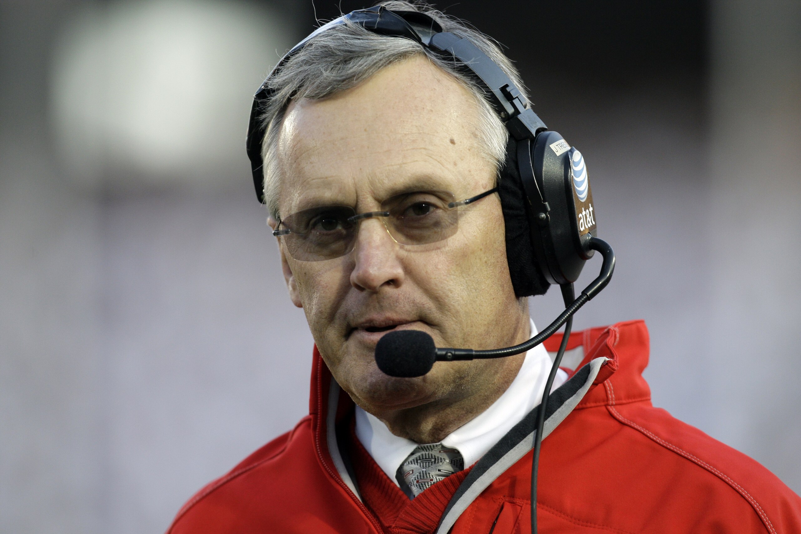 In this Saturday, Nov. 7, 2009, photo, Ohio State coach Jim Tressel walks the sideline during the first half of an NCAA college football game against Penn State in State College, Pa. (AP Photo/Carolyn Kaster)