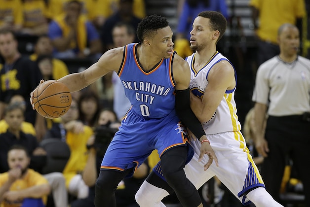 Oklahoma City Thunder guard Russell Westbrook (0) is guarded by Golden State Warriors guard Stephen Curry during the second half of Game 7 of the NBA basketball Western Conference finals in Oakland, Calif., Monday, May 30, 2016. (AP Photo/Marcio Jose Sanchez)