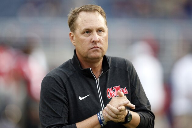 Mississippi football coach Hugh Freeze watches his team warmup prior to their NCAA college football game against Texas A&M in Oxford, Miss., Saturday, Oct. 24, 2015. (AP Photo/Rogelio V. Solis)