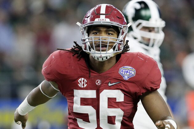Alabama linebacker Tim Williams (56) celebrates after tackling Michigan State quarterback Connor Cook (18) causing intentional grounding call against Michigan State during the second half of the Cotton Bowl NCAA college football semifinal playoff game, Thursday, Dec. 31, 2015, in Arlington, Texas. (AP Photo/LM Otero)