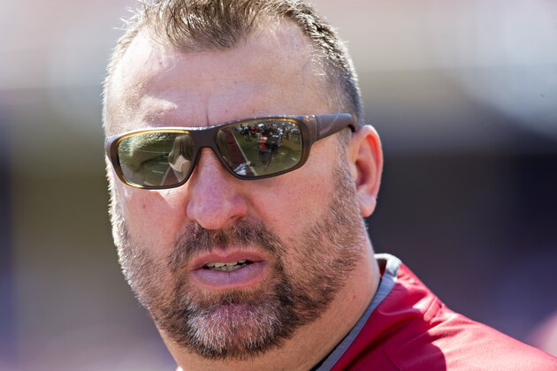 FAYETTEVILLE, AR - APRIL 23:  Head Coach Bret Bielema of the Arkansas Razorbacks White team watches his team warm up before the annual Razorback Red & White Spring Game at Donald W. Reynolds Razorback Stadium on April 23, 2016 in Fayetteville, Arkansas.  (Photo by Wesley Hitt/Getty Images)