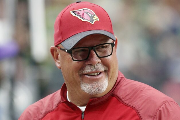 FILE - In this Jan. 3, 2016, file photo, Arizona Cardinals head coach Bruce Arians smiles during an NFL football game against the Seattle Seahawks, in Glendale, Ariz. Nearly every coach and every player heading to the playoffs will insist how beneficial skipping wild-card weekend is. It’s all about the bye in January. (AP Photo/Rick Scuteri, File)