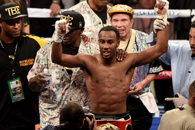 LAS VEGAS, NV - SEPTEMBER 13:  Mickey Bey celebrates his split-decision victory over Miguel Vazquez after their IBF lightweight title fight at the MGM Grand Garden Arena on September 13, 2014 in Las Vegas, Nevada.  (Photo by Ethan Miller/Getty Images)