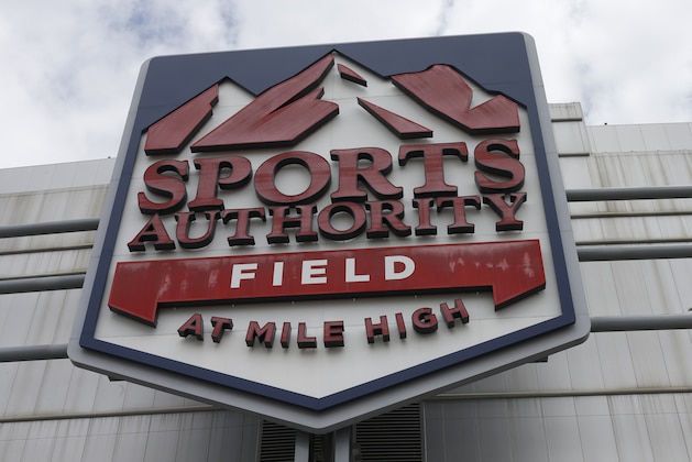 In this Thursday, May 26, 2016, photograph, the sign for Sports Authority Field at Mile High is shown on the south end of the stadium that is the home of the NFL football team Denver Broncos in Denver. The demise of Sports Authority has reignited a fight in Colorado over the future of the Denver Broncos’ stadium, a place long tied to the city’s identity. Sports Authority hopes to sell off its naming rights to the stadium, but the Broncos and officials appointed to run the taxpayer-built stadium are fighting that in bankruptcy court.  (AP Photo/David Zalubowski)