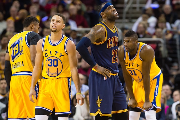 CLEVELAND, OH - JANUARY 18: Stephen Curry #30 of the Golden State Warriors and LeBron James #23 of the Cleveland Cavaliers react during the first half at Quicken Loans Arena on January 18, 2016 in Cleveland, Ohio. NOTE TO USER: User expressly acknowledges and agrees that, by downloading and/or using this photograph, user is consenting to the terms and conditions of the Getty Images License Agreement. Mandatory copyright notice. (Photo by Jason Miller/Getty Images)