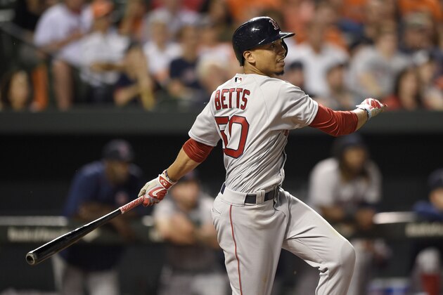 Boston Red Sox' Mookie Betts watches his home run during the seventh inning of a baseball game against the Baltimore Orioles, Tuesday, May 31, 2016, in Baltimore. Betts hit three home runs as the Red Sox won 6-2. (AP Photo/Nick Wass)