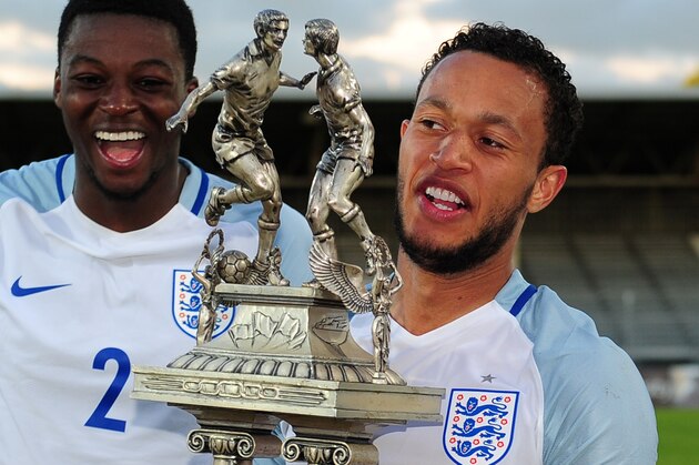 AVIGNON, FRANCE - MAY 29: Lewis Baker of England(R) celebrates with the trophy during the Final of the Toulon Tournament between England and France at Parc Des Sports on May 29, 2016 in Avignon, France. (Photo by Harry Trump/Getty Images)